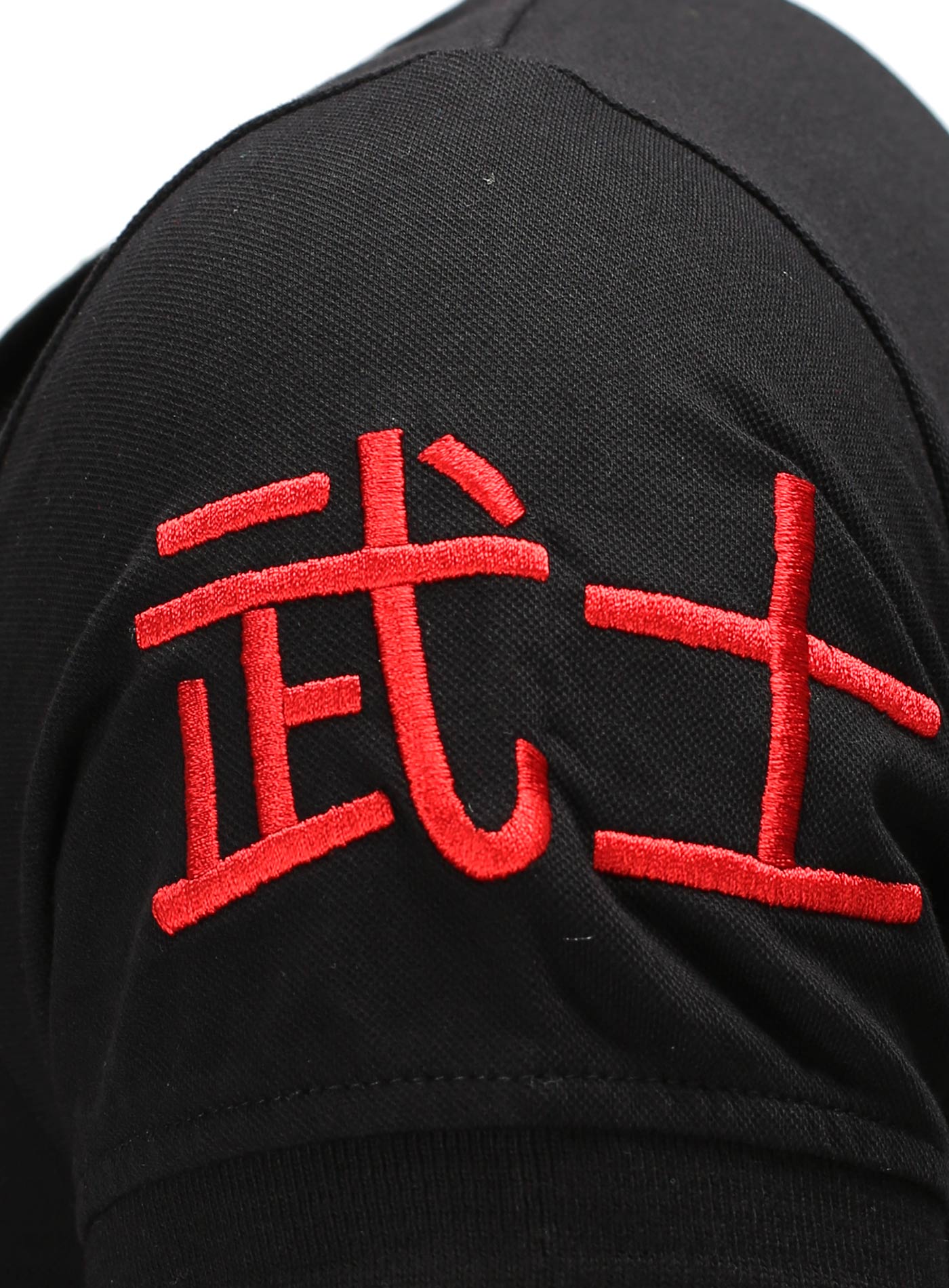 Poloshirt mit Stickereien und Applikationen Design
